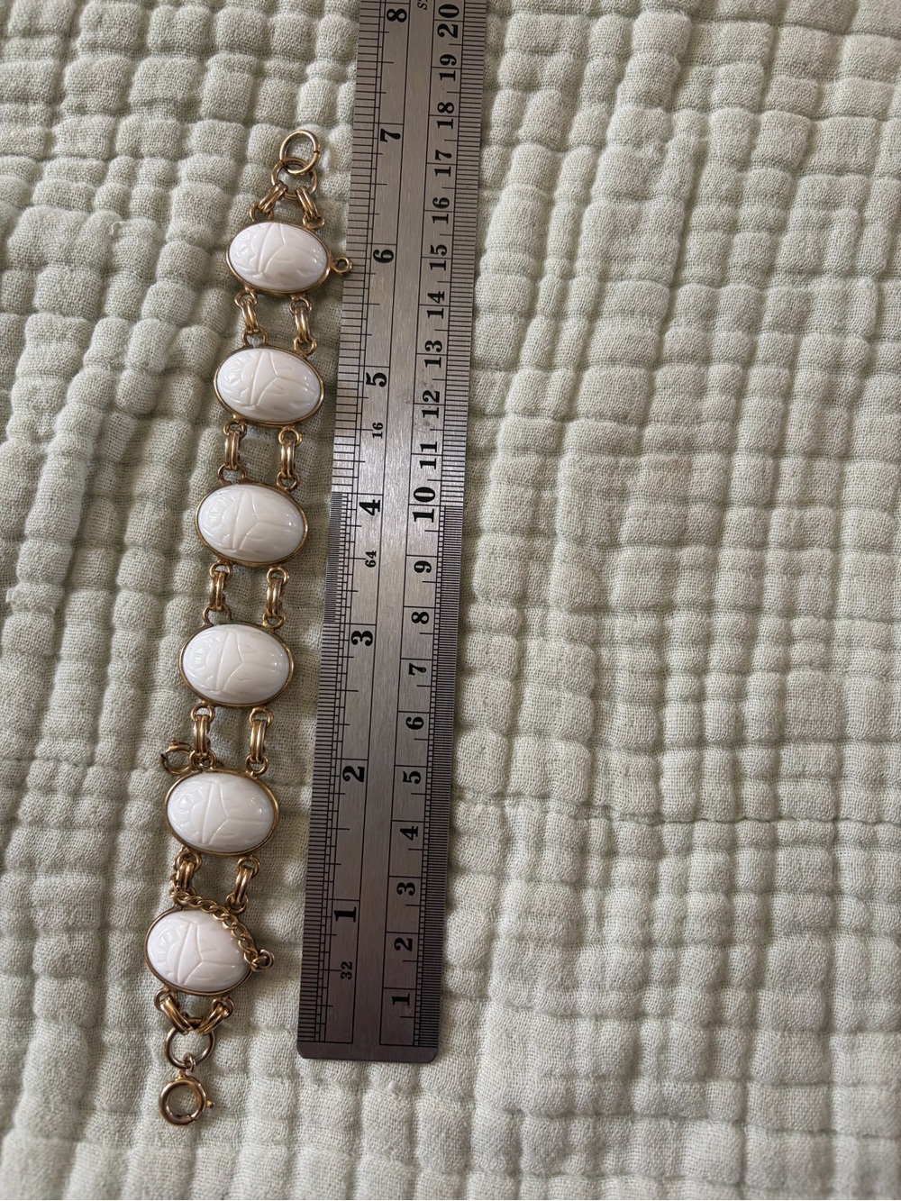 Gold-Tone Bracelet with Cream Oval Stones